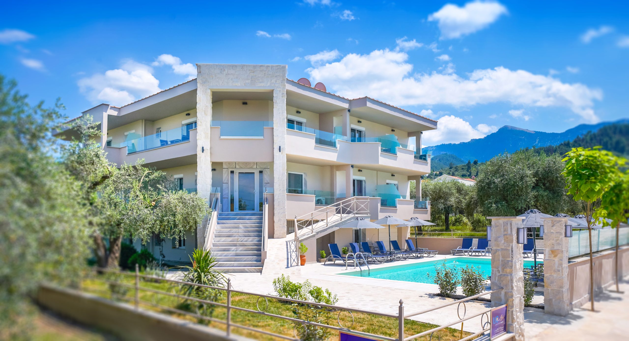 Iliomagic Luxury Suites Limenas Thassos exterior with traditional olive trees