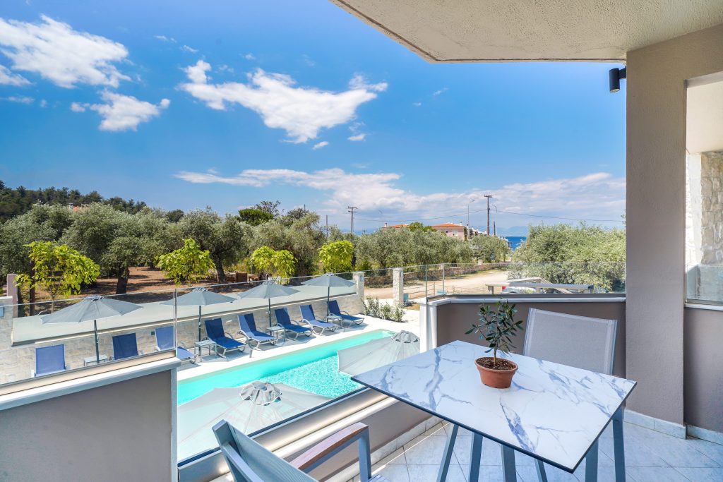 Pool view from the balcony at iliomagic luxury suites, accomodation in limenas thassos